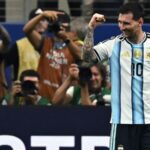 messi-makes-world-cup-history-to-send-argentina-into-last-32
