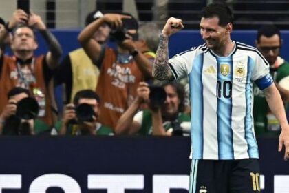 messi-makes-world-cup-history-to-send-argentina-into-last-32