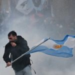 protesters-clash-with-police-in-buenos-aires-over-private-property-bill