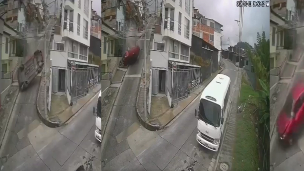 impactante-video-capto-a-un-conductor-que-perdio-el-control-de-su-vehiculo-y-cayo-por-una-pendiente-en-manizales:-choco-contra-una-vivienda